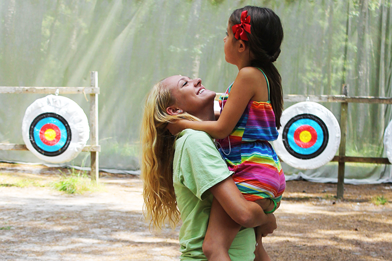 girl at archery range