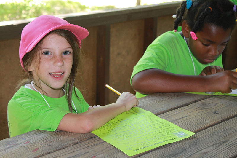 girl at camp firefly